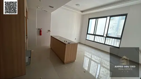 **“Elegant brand-new apartment with one free month, featuring a master bedroom, spacious living room, equipped kitchen, 2 bathrooms, close to Ajman Co