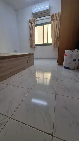 A fully furnished room in a 2BHK with kitchen facility near clocktower Sharjah