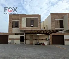A luxurious villa is for sale in Al Zahiyah, close to all amenities. It boasts deluxe finishing, fiv