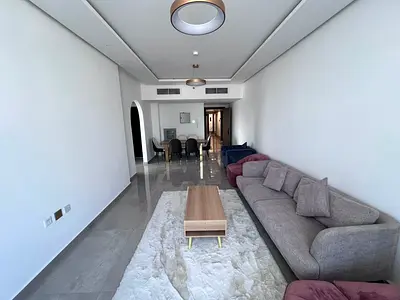Two-bedroom apartment with a living room - Al Nuaimiya 3, Ajman - Central air conditioning - Family accommodation - Spacious