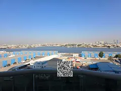 For annual rent in Ajman, a furnished one-bedroom apartment with a living room is available in the O