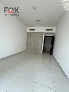 2 master bedrooms in Al Rashidiya, 2 balconies with open view, built-in wardrobes, prime location, c