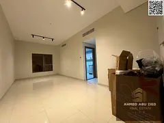 Two bedrooms, large living room, spacious kitchen, two bathrooms, central air conditioning, balcony