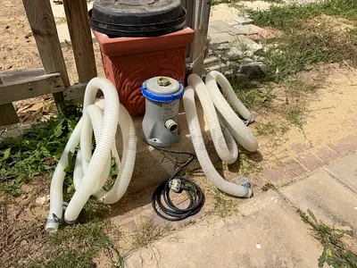 My above-ground pool filter/pump with hoses and power cable