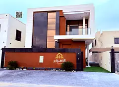Luxury villa for sale in Al Bahia area, featuring two floors and a rooftop terrace. Modern design, s