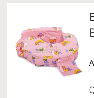 Gently used pink nursing/feeding pillow with cover