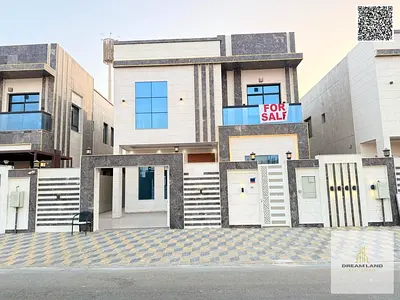 Villa with all-inclusive price (electricity, water, and air conditioning) on ​​the main street, ready to move in, in one of Ajman's most prestigious a