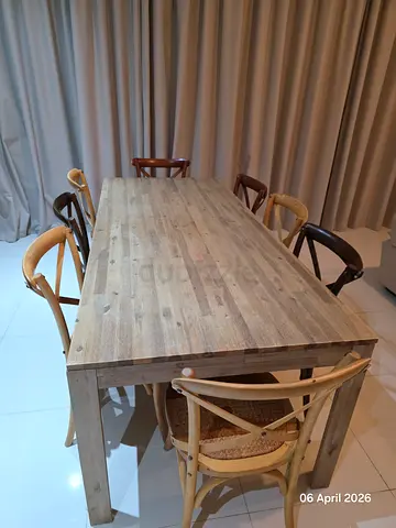 My rustic wooden dining table with 8 chairs