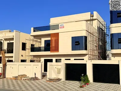 A villa with all-inclusive price (electricity, water, and air conditioning) on ​​the main street, ready to move in, in one of Ajman's most prestigious