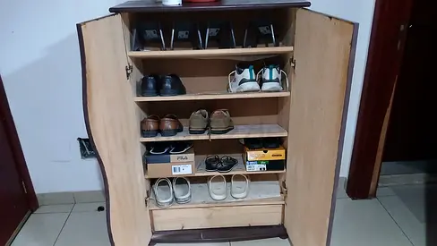 Wooden shoe cabinet with doors and multiple shelves - used