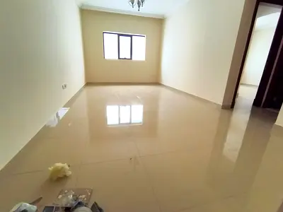 LIKE NEW 1 BEDROOM HALL 2 BATHROOM WARDROBE BUILT-IN COVERED PARKING NEW MUWAILEH READY TO MOVE FOR FAMILY ONLY 42K