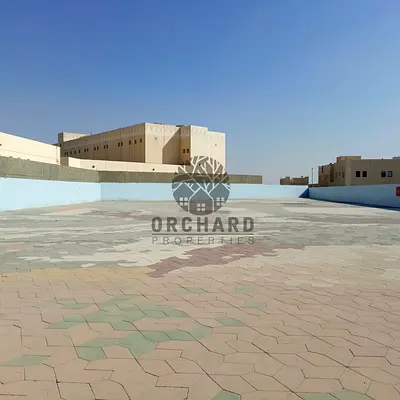 Open yard Ready to move prime location Emirates industrial area al sajaa rent 360k