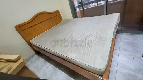 Used wooden double bed frame with mattress (included)