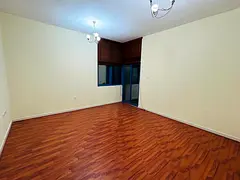 The apartment consists of a bedroom and a living room with a modern design that prioritizes comfort