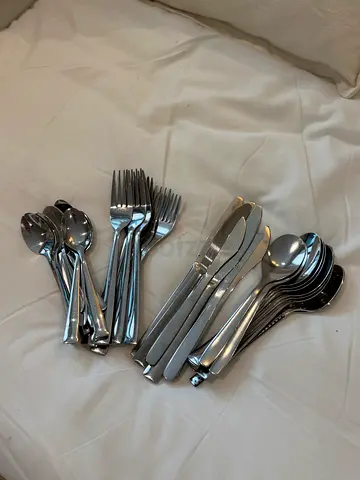 Stainless steel cutlery set - forks, knives  spoons (used)