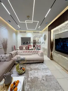 Apartment for sale in Ajman One Tower 9, two bedrooms, living room and open kitchen