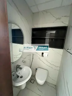 A brand new, luxurious two-bedroom apartment with a living room is available for rent in Sharjah'