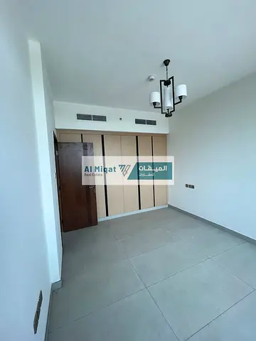 A brand new, luxurious two-bedroom apartment with a living room is available for rent in Sharjah's Muwaileh Commercial Area, Al Falah district