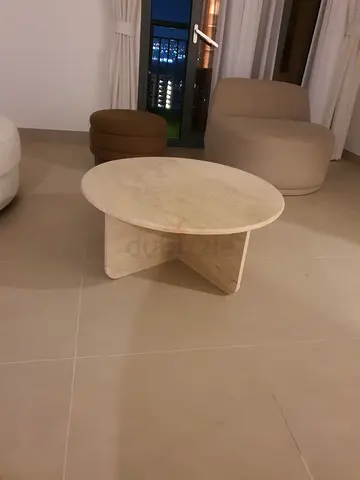Round travertine coffee table - modern design