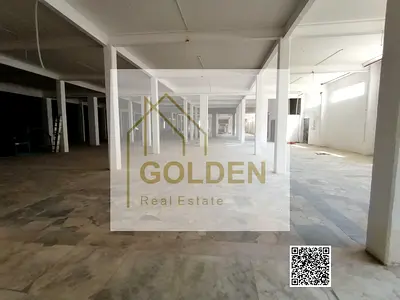 جاهز للاستلام | مستودع صناعي بميزانين للايجار السنوي بصناعية عجمان | كهرباء 3فاز