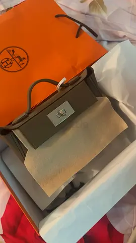 My grey mini top-handle handbag — orange box included