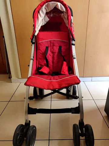 Red lightweight baby stroller - used, good condition