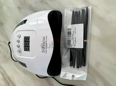 SUN X7 UV/LED Gel Nail Lamp with Nail Art Tools (negotiable)