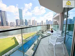 Bright 1BR in Peninsula Three | Scenic Water Views