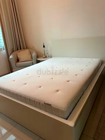 Ikea double bed size is 140/200 with mettres available in perfect condition