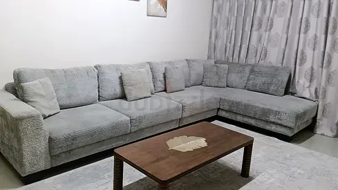 Light grey L-shaped sofa from royal furniture — excellent condition