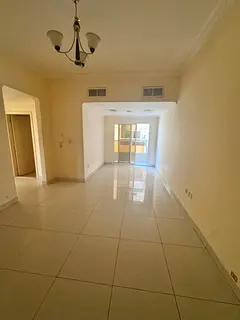 Two-bedroom apartment with a living room - Al Nuaimiya, 1 Ajman - near Al Hikma School - central air
