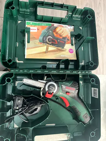 Bosch Cordless Mini Saw with Charger  Case - Good Condition