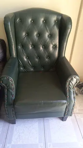 Dark green leather wingback armchair (tufted) - used
