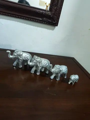 Set of 4 Silver Elephant Figurines - Decorative Home Accents