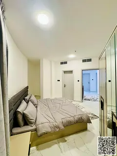 For monthly rent: Luxurious furnished one-bedroom apartment with a living room, in Ajman Corniche. I