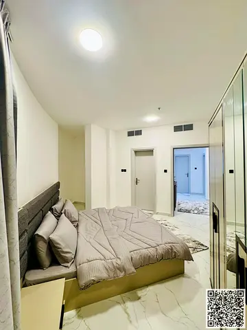 For monthly rent: Luxurious furnished one-bedroom apartment with a living room, in Ajman Corniche. Includes all bills and internet.