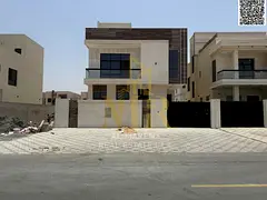 Luxury villa for sale in Al Yasmin - two floors and a roof in a prime location near the mall with a