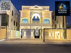 Opportunity to own a two-story villa in the most prestigious area of ​​Ajman, with a rooftop, in