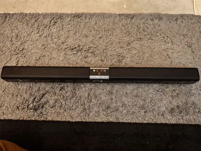 Compact black soundbar - slim TV speaker (good condition)