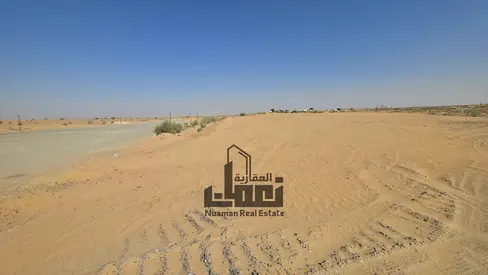 Investment Land for Sale on Two Roads in Al Sajaa – Strategic Location
