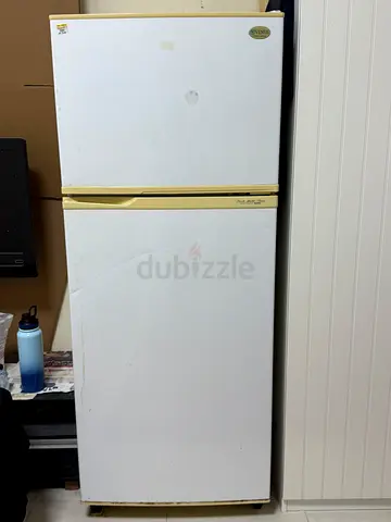 White top-freezer refrigerator (working)