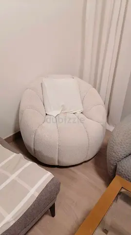 White boucle round lounge chair - cozy accent chair