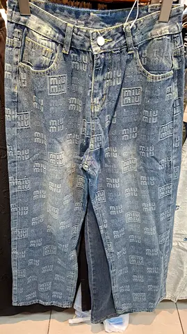 Miu Miu monogram denim jeans