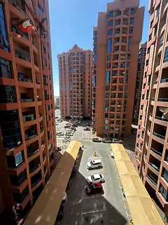 One bedroom and living room in Al Nuaimiya Towers / with balcony / open view / excellent size / suit