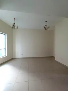 A well-located 2-bedroom apartment with a living room and balcony is available for annual rent in Al