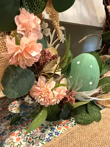 Floral burlap wreath with faux eucalyptus and egg accent