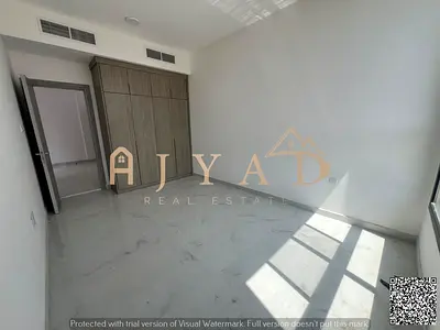 For annual rent, first occupancy, beautiful one-bedroom apartment in Al Alia area, near Sheikh Mohammed Bin Zayed Road, with built-in wardrobes