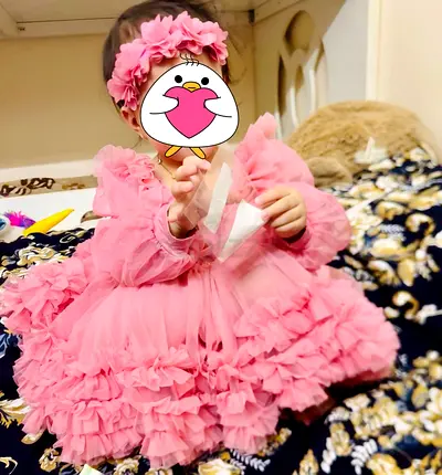 Pink ruffle party dress for baby with matching headband