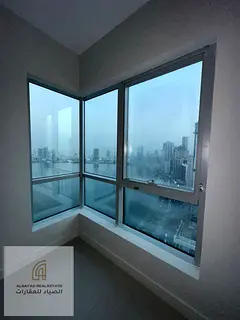For sale: A distinctive apartment overlooking Khalid Lake, consisting of two bedrooms and a living r