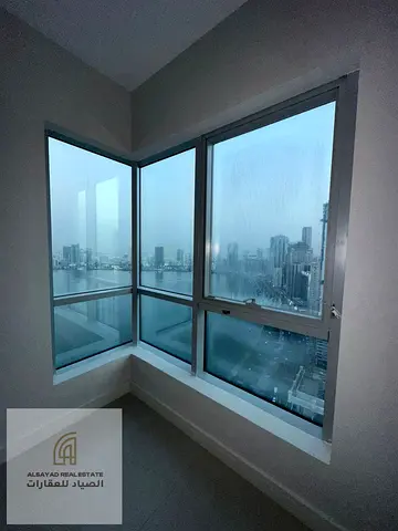 For sale: A distinctive apartment overlooking Khalid Lake, consisting of two bedrooms and a living room.